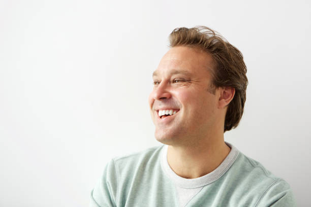 istock Handsome young man looking away and smiling 656395244