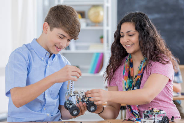 istock High school lap partners build robot together 656396150