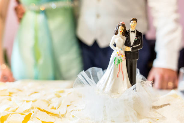 istock beautiful wedding cake with topper 656396252