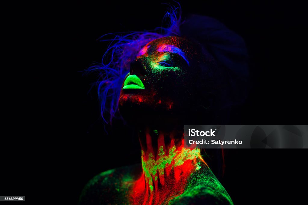 Beautiful Extraterrestrial Model Woman With Blue Hair And Green Lips In Neon  Light It Is Portrait Of Beautiful Model With Fluorescent Makeup Art Design  Of Female Posing In Uv With Colorful Make