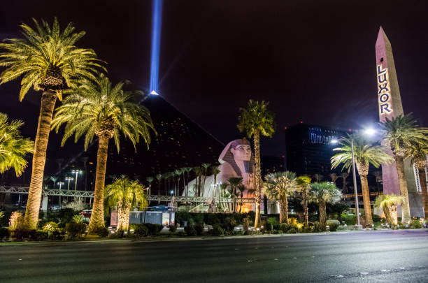 Luxor Hotel and Casino and Sky Beam at night - Las Vegas, Nevada, USA Las Vegas, Nevada, USA - December, 2016: Luxor Hotel and Casino and Sky Beam at night las vegas metropolitan area luxor luxor hotel pyramid stock pictures, royalty-free photos & images
