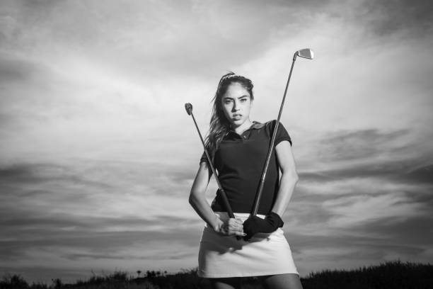 istock Young Hispanic Women Golfer Posing With Two Irons 656402936