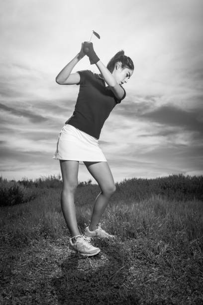 istock Young Hispanic Women Golfer Ready To Hit 656403318