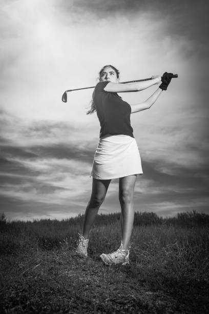 istock Young Hispanic Women Golfer Ready To Hit 656405544
