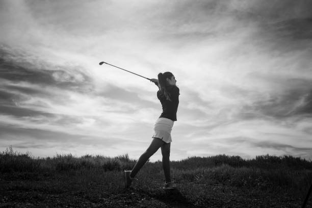 istock Silhouette Of Women Golfer 656405940
