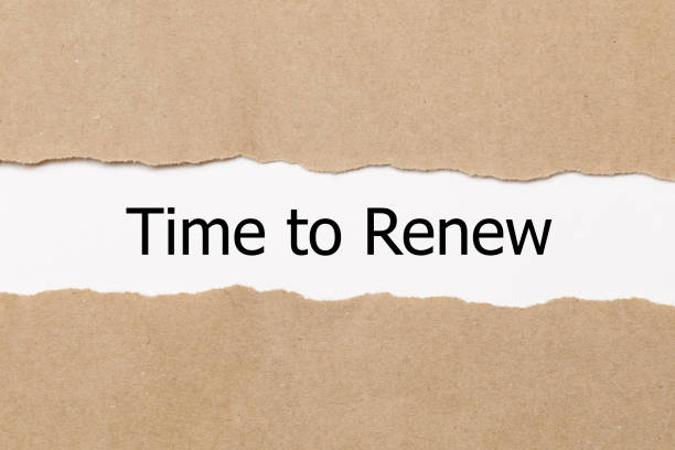 istock The text time to renew appearing behind torn paper 656406028