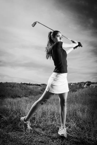 Young Hispanic Women Golfer Ready To Hit