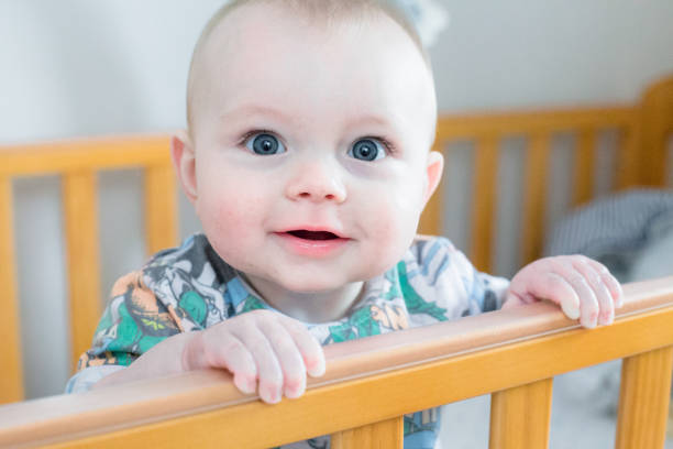 istock Baby boy in his Crib 656407910