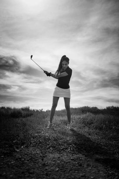 istock Silhouette Of Women Golfer 656409994