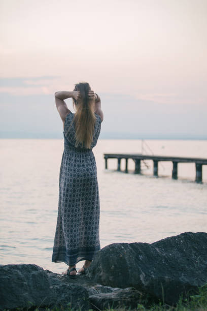 istock Women enjoy the sunset 656411162