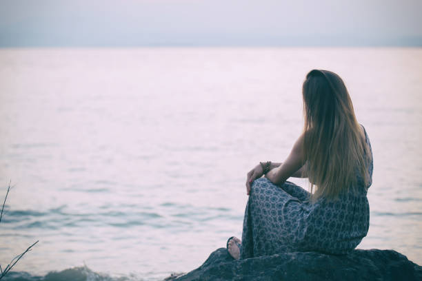 istock Women enjoy the sunset 656411320