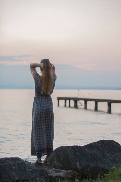 istock Women enjoy the sunset 656413622