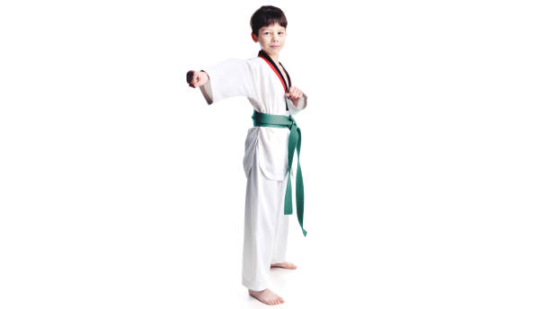 istock Young, preschool boy in kimono, isolated on white background 656414940
