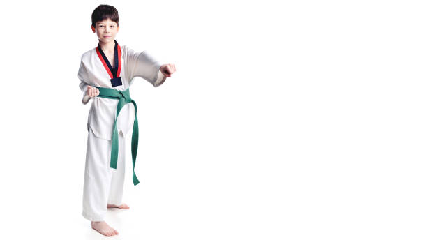 istock Young, preschool boy in kimono, isolated on white background 656414948