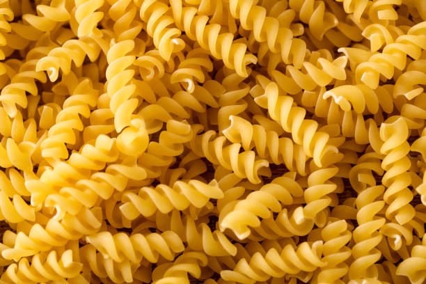 istock fresh macaroni Italian pasta background 656417648