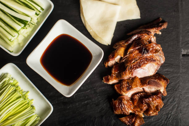 Peking Duck. China traditional food. Restaurant. Top view. Close up Peking Duck. China traditional food. Restaurant. Top view. Close up hoisin sauce stock pictures, royalty-free photos & images