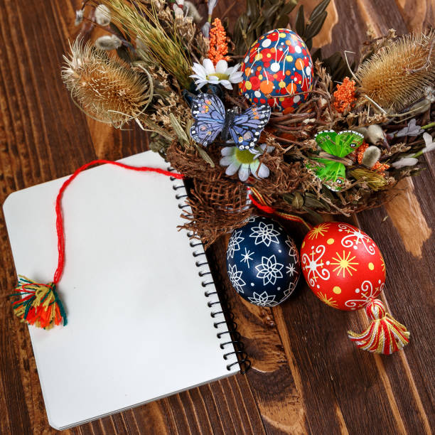 Easter wreath with Easter eggs on the wooden background. Easter themed. Easter symbol.