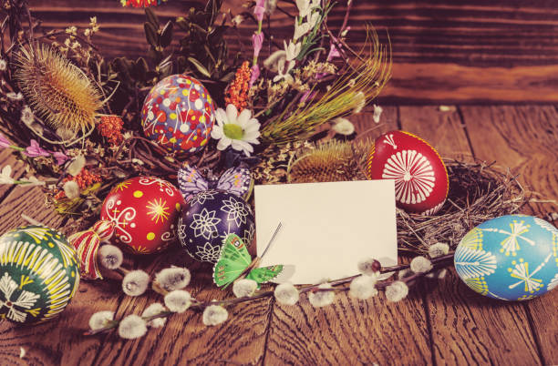 istock Easter wreath with Easter eggs on the wooden background. Easter themed. Easter symbol. 656431206
