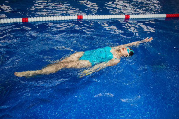 istock woman swimming at pool 656431240