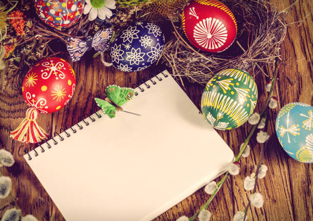 istock Easter wreath with Easter eggs on the wooden background. Easter themed. Easter symbol. 656431320