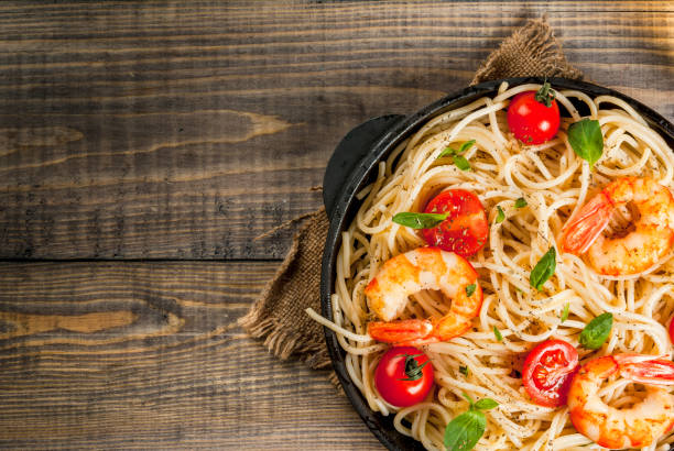 istock Pasta with grilled prawns shrimps 656435286