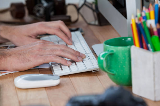 istock Photographers working at desk 656438750