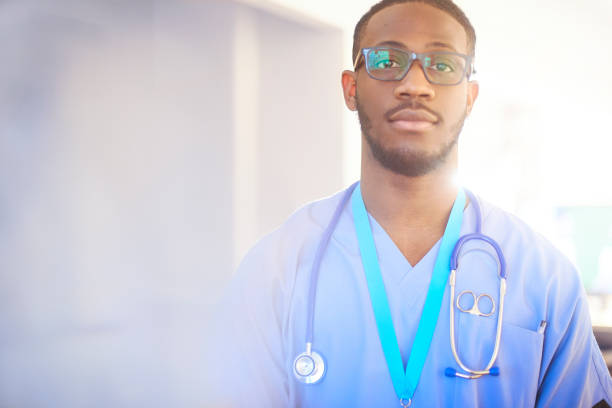 istock Junior doctor in scrubs on hospital ward 656444454