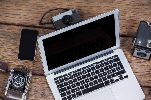 istock Close-up of laptop with cameras on table 656447196