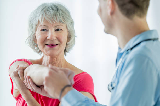 istock Senior Woman Stretching at a Physical Therapist 656447316