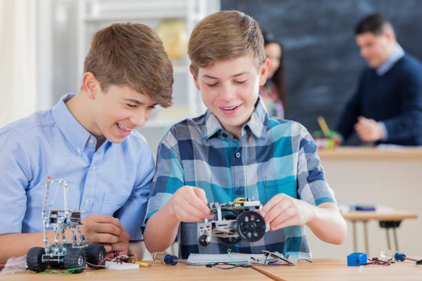 istock STEM high school students build robotic vehicles at school 656448284