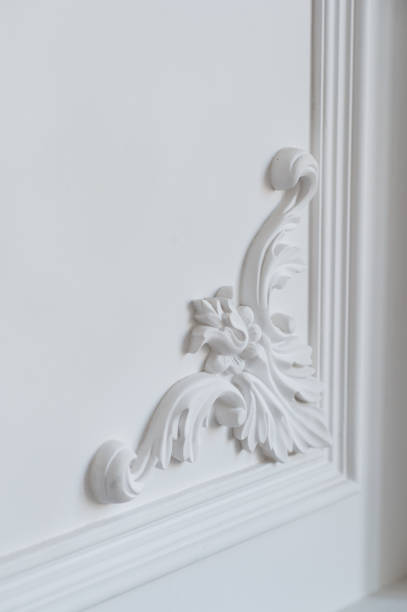 istock White wall molding with geometric shape and vanishing point. Luxury white wall design bas-relief with stucco mouldings roccoco element 656455706