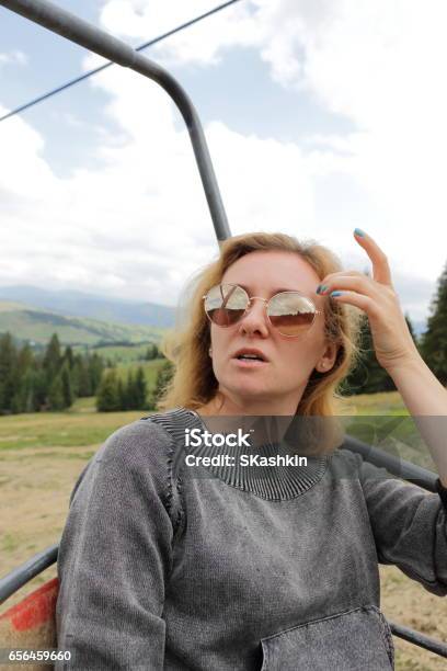 Woman At Ski Lift Stock Photo - Download Image Now - 20-29 Years, 30-39 Years, Active Lifestyle