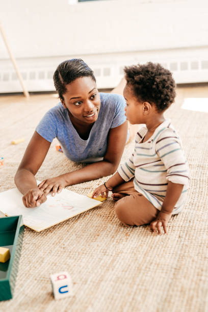 istock Mom reading for toddler 656463664