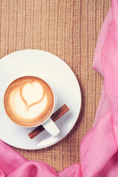 istock Coffee with pink scarf. Valentines concept. Rustic style. Flat lay view. 656463828