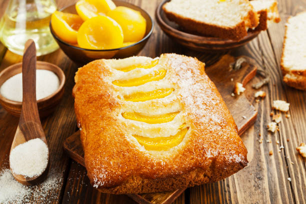istock Semolina pie with canned peaches 656464176