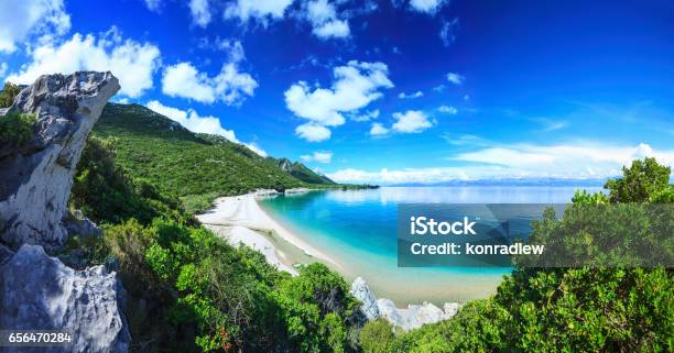 Beach Crystal Clear Water In Adriatic Sea And Green Mountains Stock Photo - Download Image Now