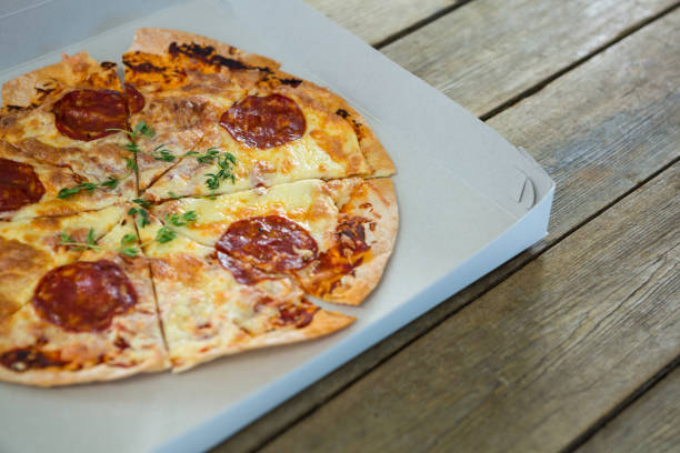 istock Close-up of Italian pizza in a opened box 656479486