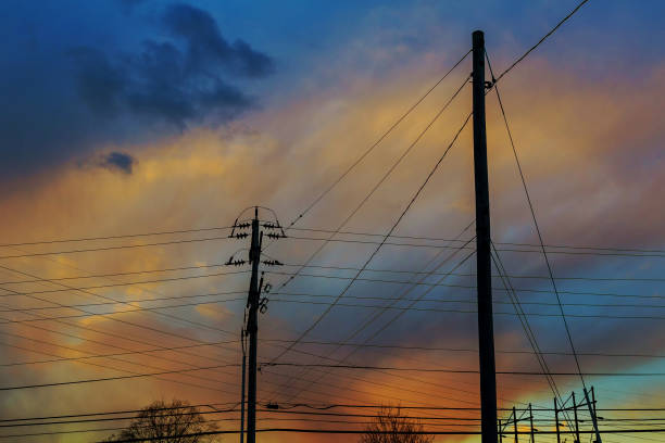 istock electricity poles at sunset with colorful cloud 656480734