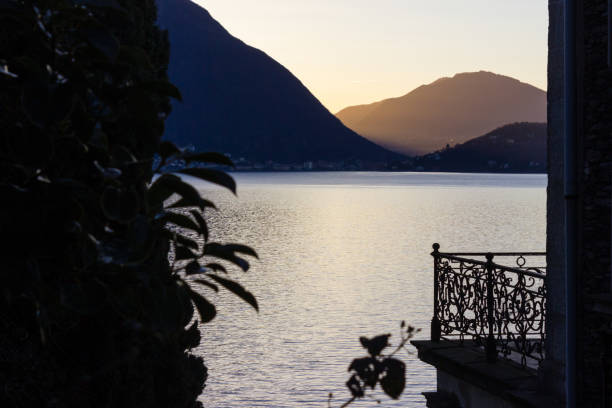 istock lake lago maggiore coast sunrise says here comes the sun 656497580