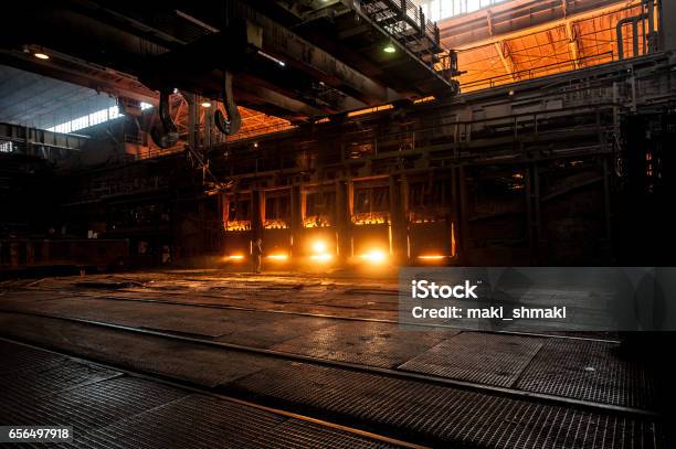 Steelworker Near The Working Open Hearth Furnace Stock Photo - Download Image Now - Molten, Alloy, Blast Furnace