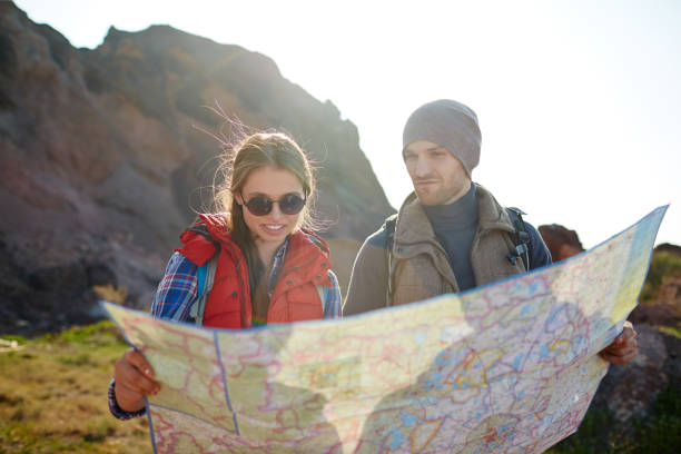 istock Young Tourists Hiking in Mountains 656508070