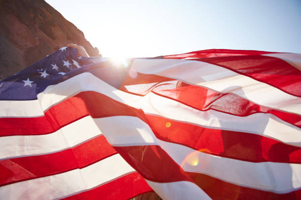 istock Waving American Banner in Sunlight 656508140