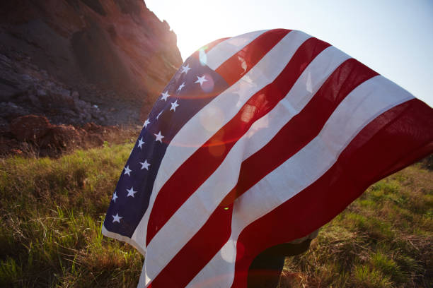 istock Couple Covered by USA Flag 656508144