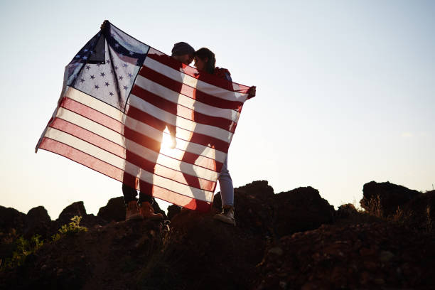 istock Romantic Couple Holding USA Flag on Top 656508196