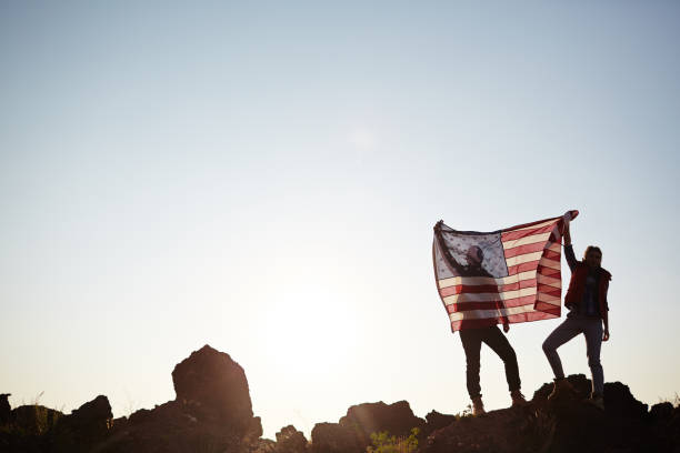istock Couple with USA Flag on Mountain Top 656508198