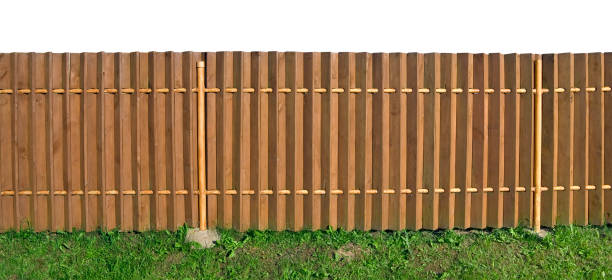 istock Solid long wooden yellow rural fence 656511142