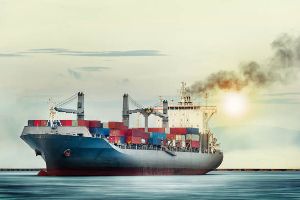 istock International Container Cargo ship in the ocean as sunset sky, Freight Transportation, Shipping 656525382