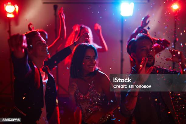 Graduation Party In Club Stock Photo - Download Image Now - Prom, Dancing, Confetti