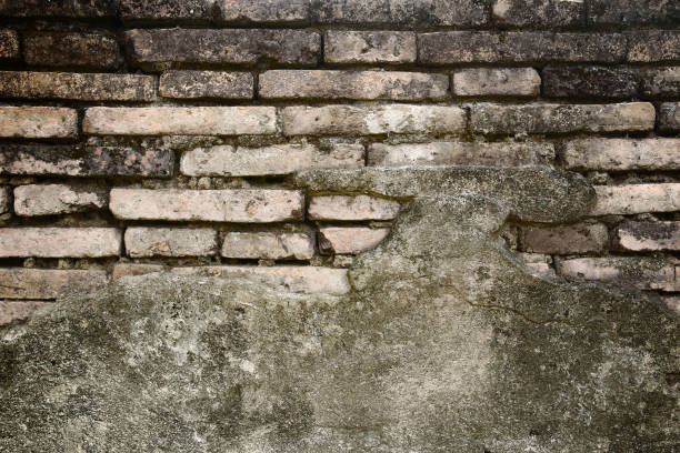 istock cracked concrete vintage brick wall background 656542322