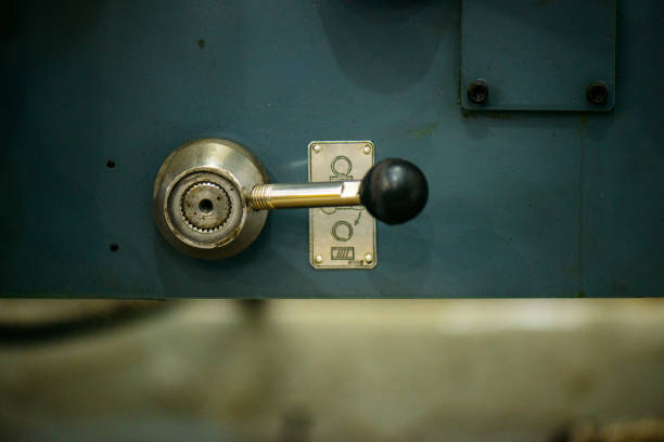 Parts and details on an old industrial lathe (industrial machining tool)